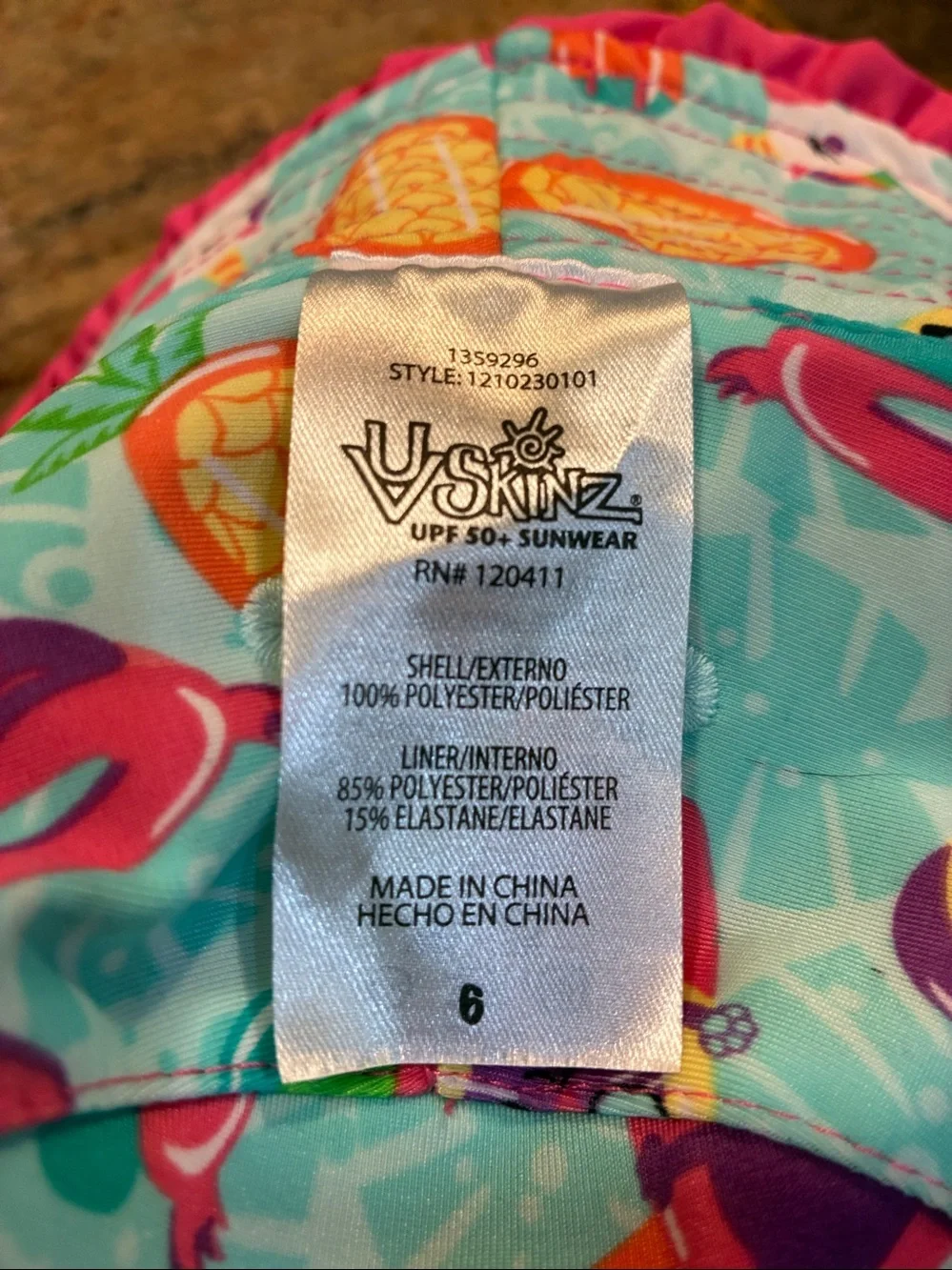 UV Skinz Reversible Bucket Hat Pink side/tropical pattern side UPF 50+, size 6